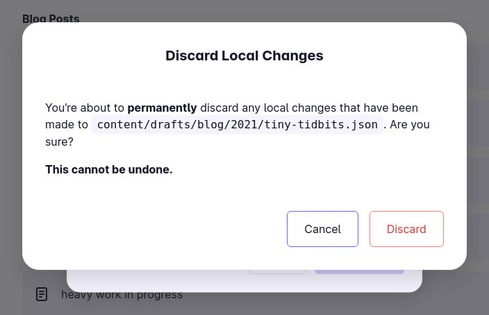 A confirmation dialog warning about the local changes being permanently discarded and the fact that that action cannot be undone